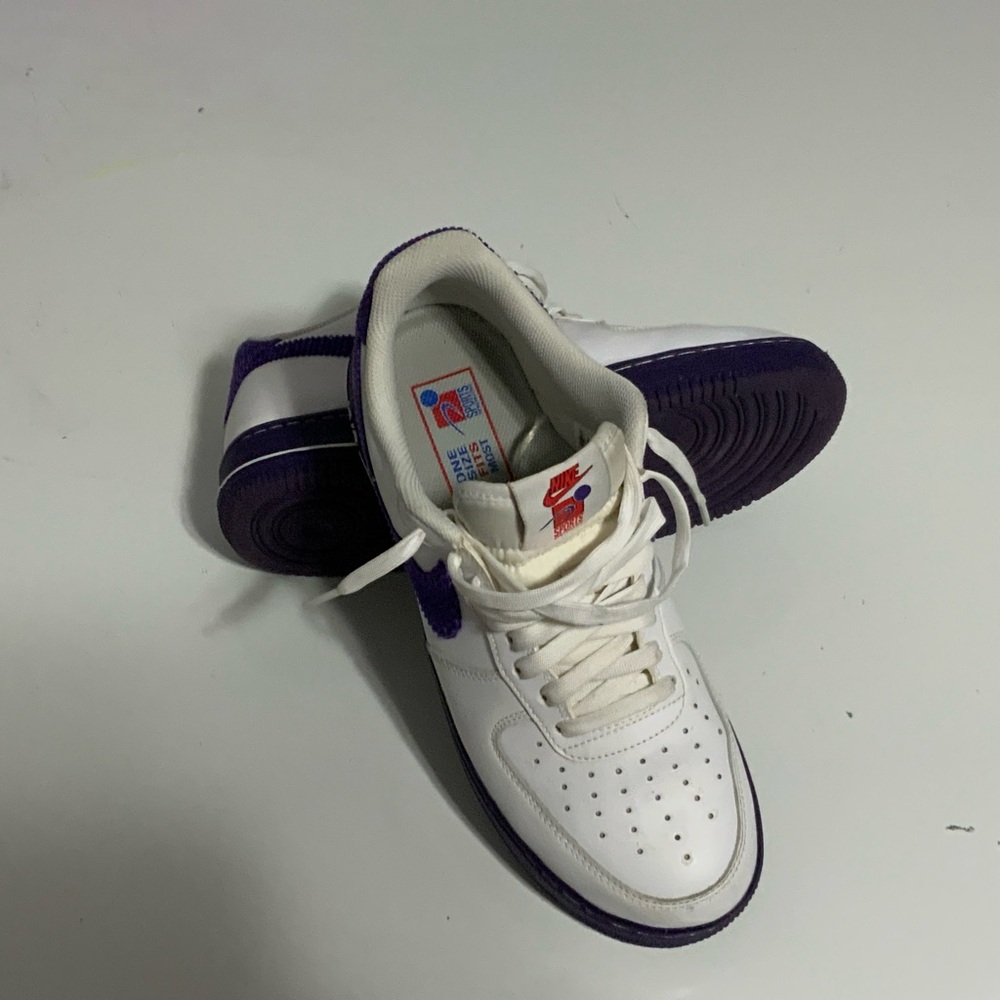 Nike White and Purple Sneakers
Nike Air Force 1 '07 LV8 EMB 'White Court Purple'
